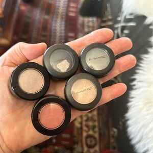 MAC used eyeshadow-3. And 2 used Merle Norman. All have sparkles except the pink